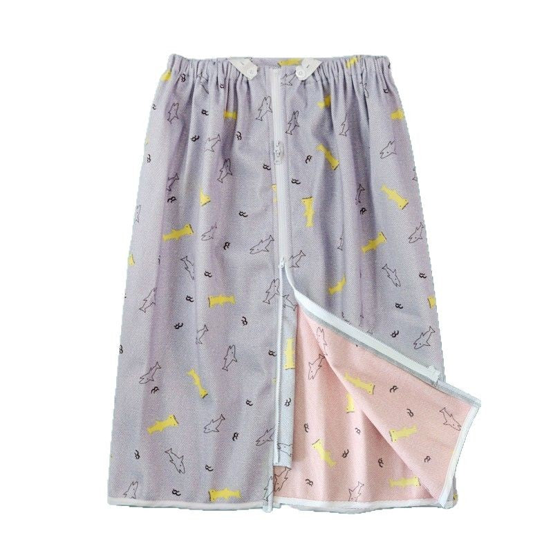 WrapGuard Washable Leak-Protection Wrap in Blue Fish print, flat lay showing reversible design